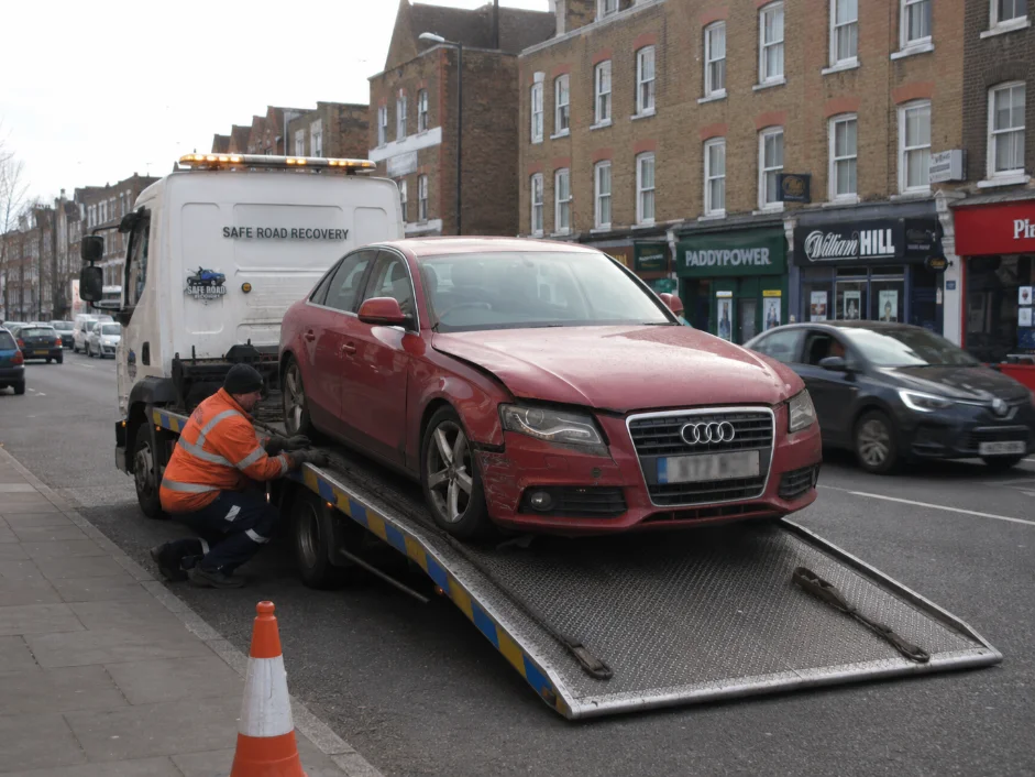 Audi Red car recovery in Southfields, United Kingdom